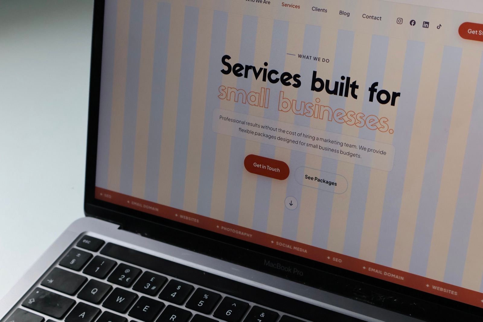 A custom website built by Marketing Handled shown on screen